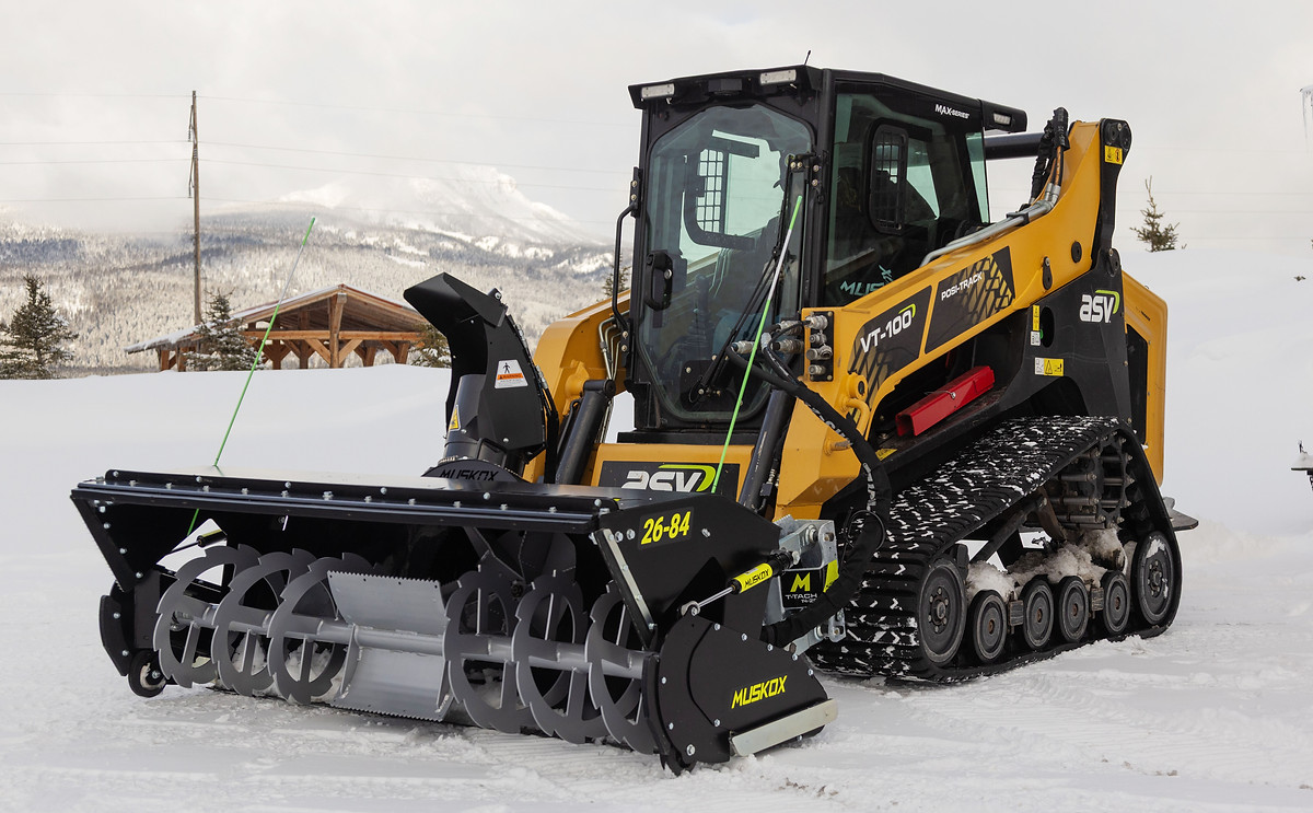 MUSKOX 26-84 on an ASV compact track loader in deep snow